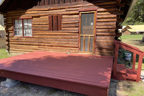 Front of cabin with deck.