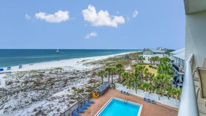 A resort with a pool, beach, and ocean view. - SUN, SAND & SURF! (Pensacola)