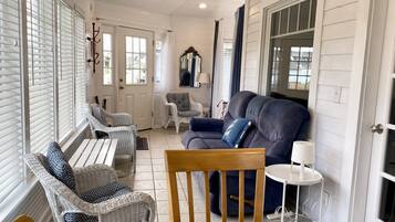 Smart TV, DVD player, table football, books