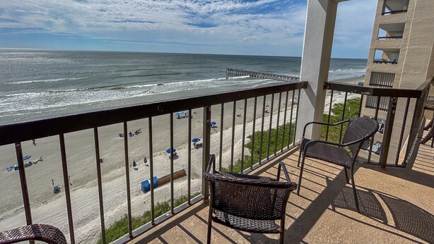 A balcony with a view of the beach and ocean. - 10% off  3-7 nights thru Oct. Cherry Grove. 3BR 3BA OF condo. Sleeps 8. (North Myrtle Beach)