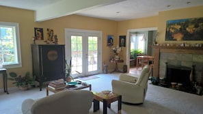 Living Room from entry way looking to French doors to deck.