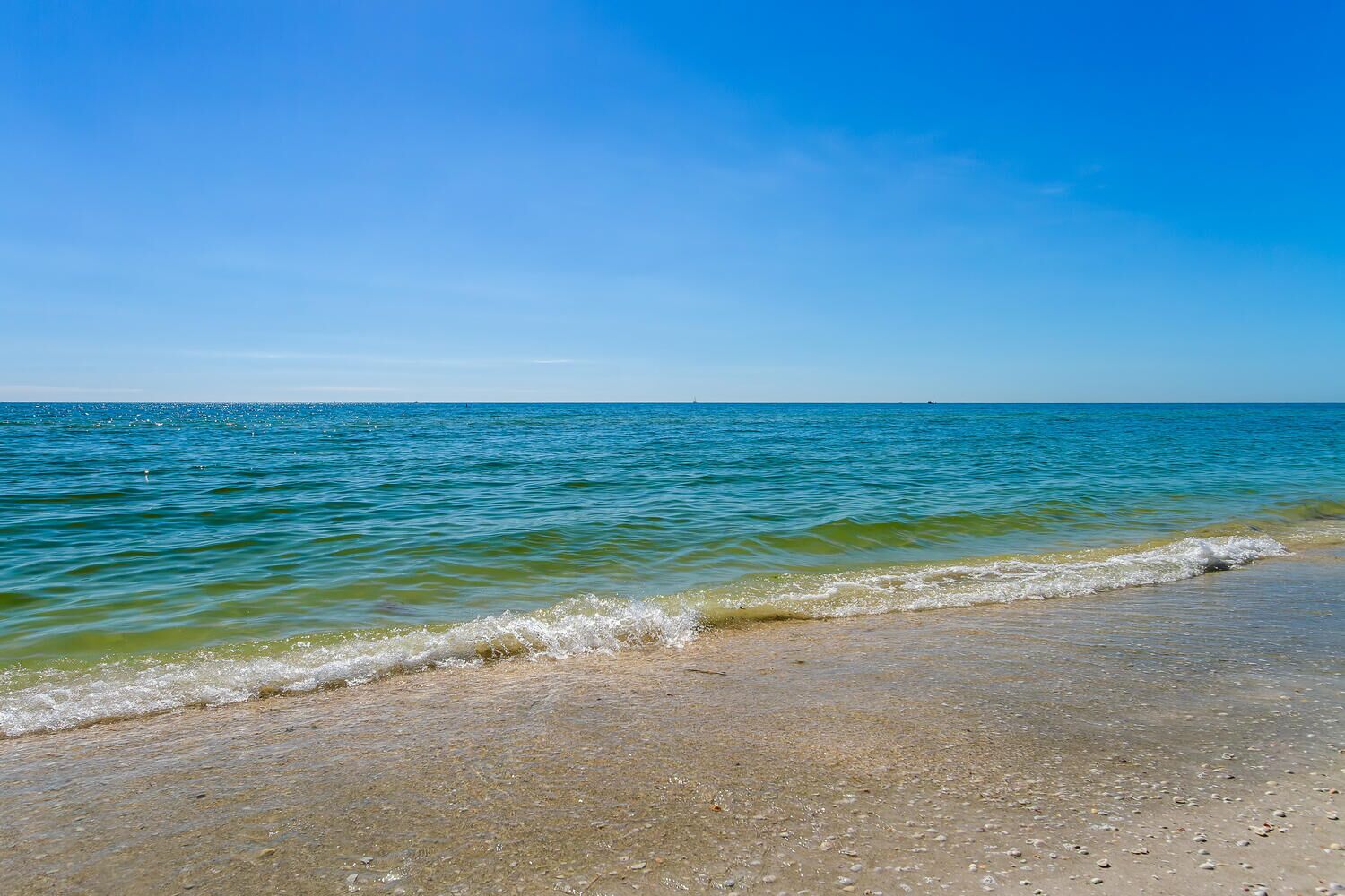 On the beach, sun loungers, beach towels