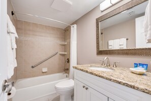 Guest bathroom with shower/tub.  Comfort height toliet. - Sundial B306--Direct Beachview, Newly Renovated, Steps to Beach (Sanibel Island)