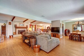 Smart TV, fireplace, books, offices