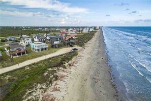 On the beach - Gulf-front home with deck, loft & direct beach access (Galveston)