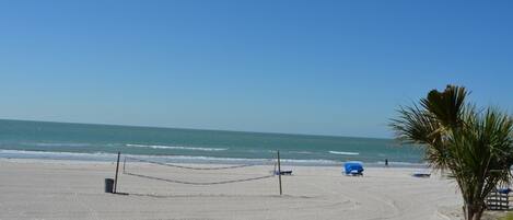 On the beach, sun-loungers, beach towels