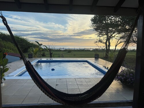 Surf, Sun & Your Private Pool – 2BR Beachfront Escape