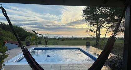 Surf, Sun & Your Private Pool – 2BR Beachfront Escape