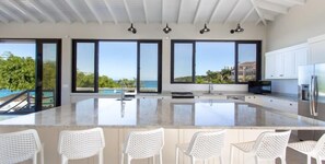 Villa | Private kitchen | Stovetop, dishwasher, coffee/tea maker, cookware/dishes/utensils - Sandcastle Beach House (The Valley)