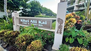 A sign for "Kihei Alii Kai" at 2387 S. KIHEI RD. - Artistic Top-Floor Tropical Penthouse – Steps to Maui’s Best Beach (Kihei)