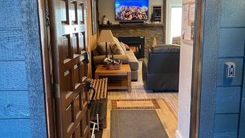 Smart TV, fireplace, DVD player, books