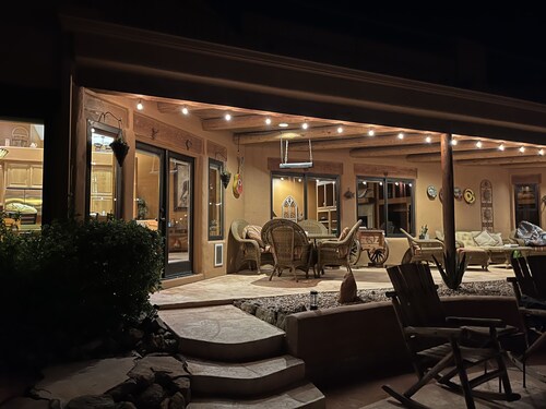Private Desert Oasis with heated pool; spa; covered deck; spectacular views.