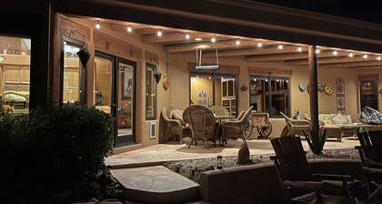 Private Desert Oasis with heated pool; spa; covered deck; spectacular views.