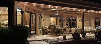 Private Desert Oasis with heated pool; spa; covered deck; spectacular views.