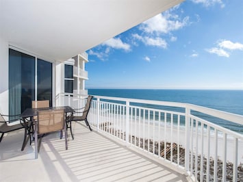Huge Corner Wrap-Around Balcony offers Dining for 4 plus Chaise Lounge!