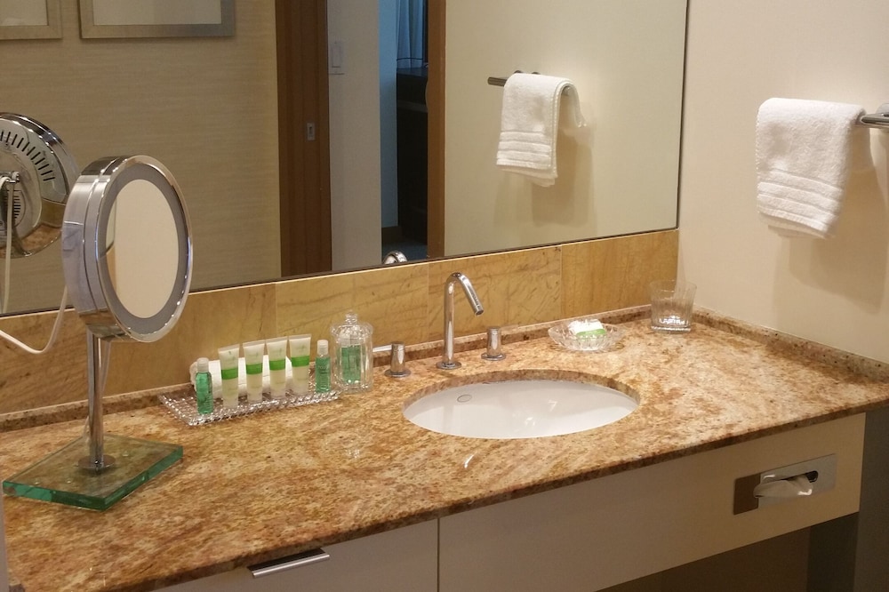 One bedroom at the AKA Hotel Residences