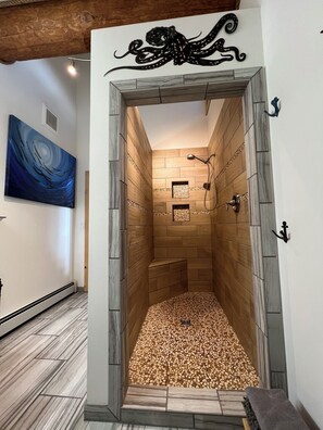 Combined shower/tub, hair dryer, towels, soap