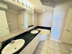 Shower, jetted tub, towels