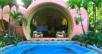 Adobe-style Dome Home with a pool In A Lush garden minutes from the beach.