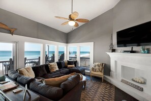 TV, fireplace - Beautiful Corner (End) Unit with Wrap-Around Balcony and Western Sunset Views (Panama City Beach)