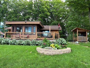 Exterior - Authentic Log Cabin on Beautiful Silver Lake in Traverse City MI. Pet Friendly! (Traverse City)