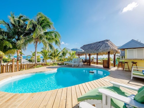 Island style, laid-back living, waterfront, pool, pier and outdoor shower