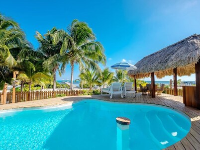  Estilo de la isla, vida relajada, frente al mar, piscina, muelle y ducha al aire libre