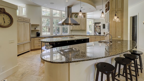 A spacious kitchen with a large island, ample natural light, and modern cabinetry. - 6 Piping Plover-A true smart home with media room! 146 Yard walk to the Beach (Hilton Head Island)