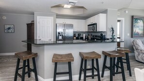 Fridge, microwave, oven, stovetop - Corner GULF FRONT Condo | 2 Premium Parking  | Walk to Pier Park | Beach Service (Panama City Beach)