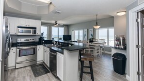 Fridge, microwave, oven, stovetop - Corner Gulf-Front Condo | 2 Premium Parking  | Walk to Pier Park | Beach Service (Panama City Beach)