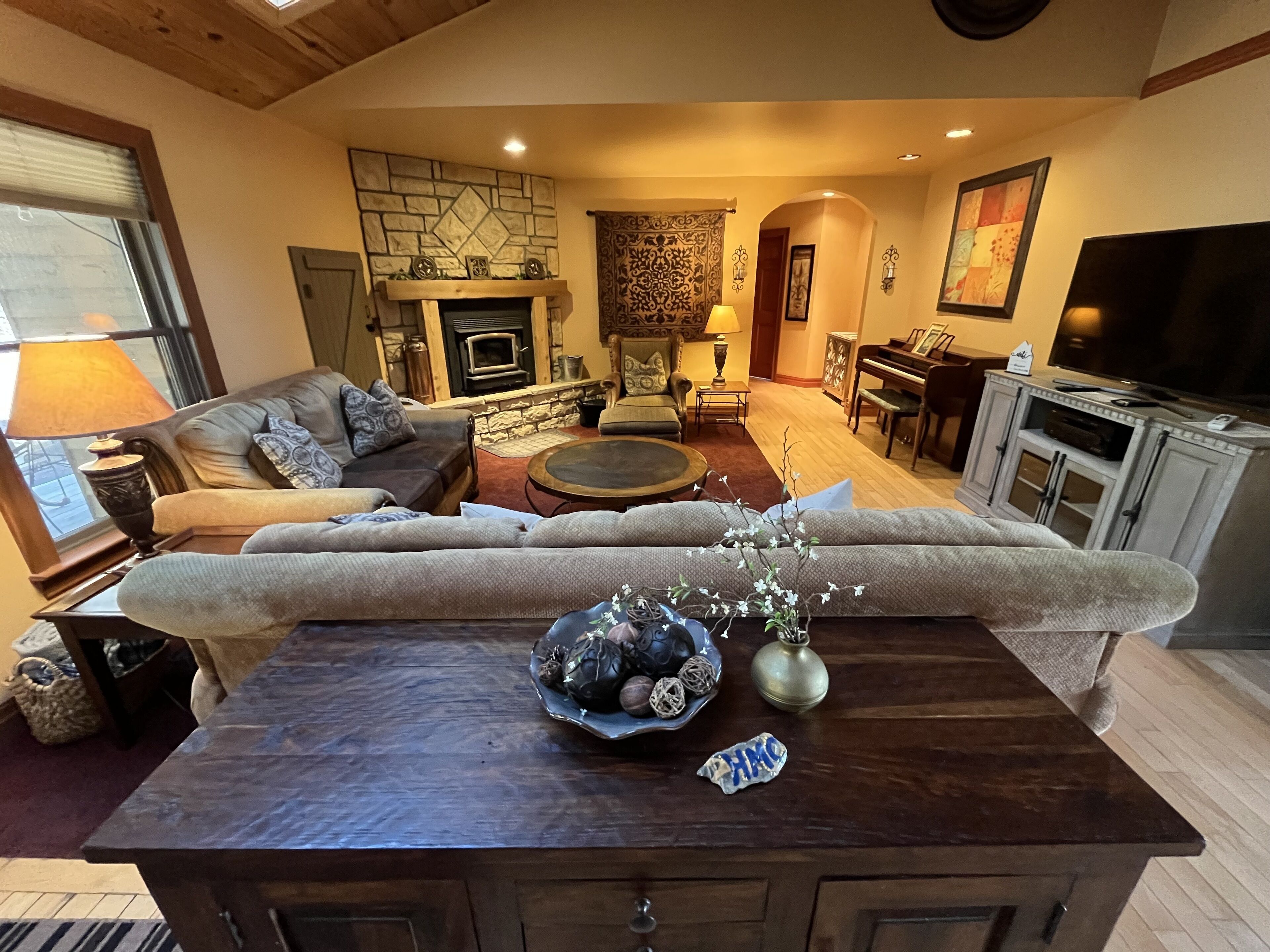 The Lodge at Harvest Moon sleeps 16 with five bedrooms and unique private Pub