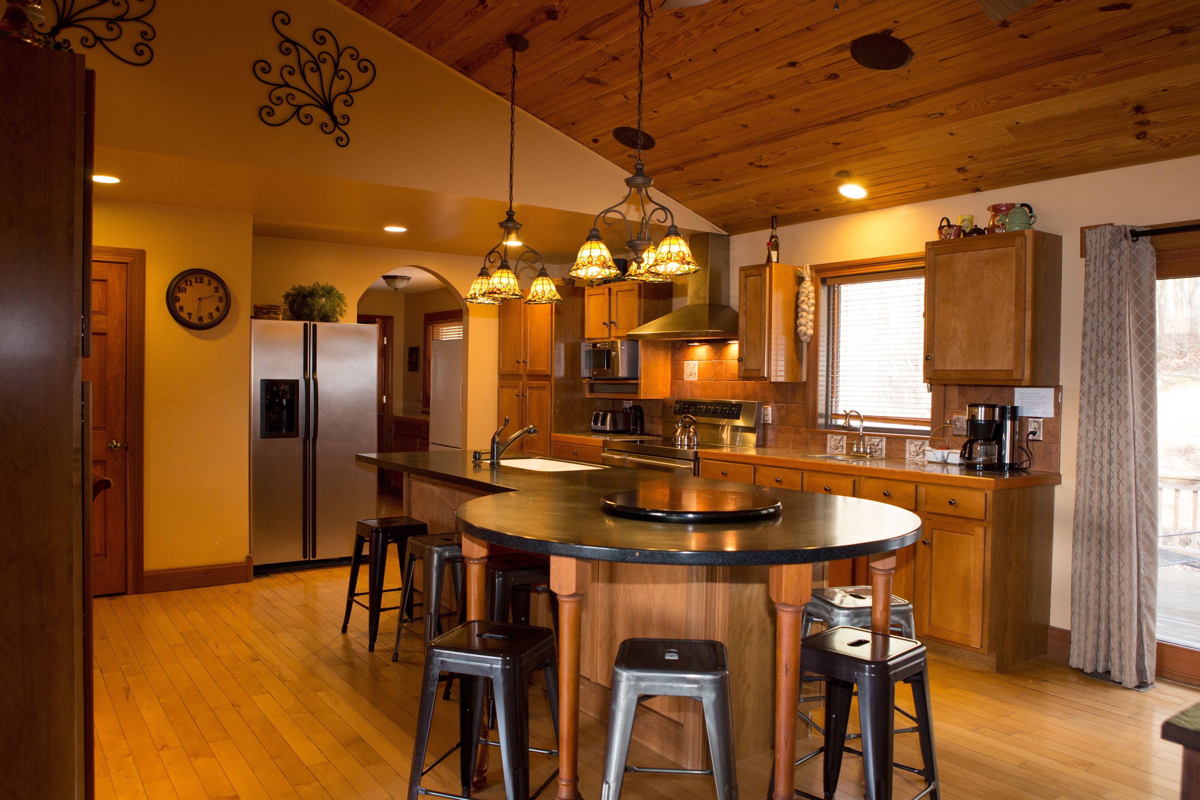 The Lodge at Harvest Moon sleeps 16 with five bedrooms and unique private Pub