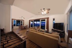Smart TV, DVD player, foosball, books