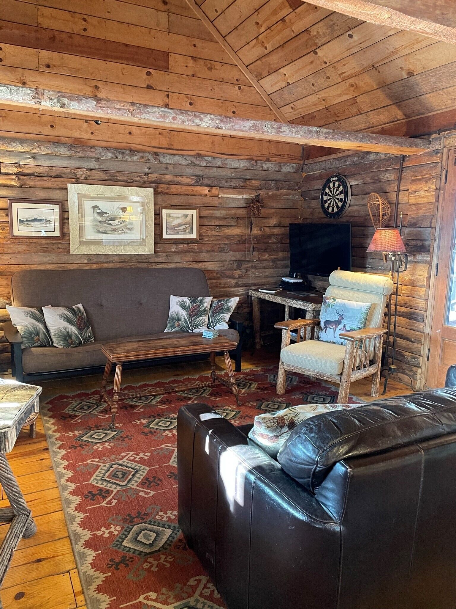 Charming Log Cabin on Private Pond Nestled in Woods.