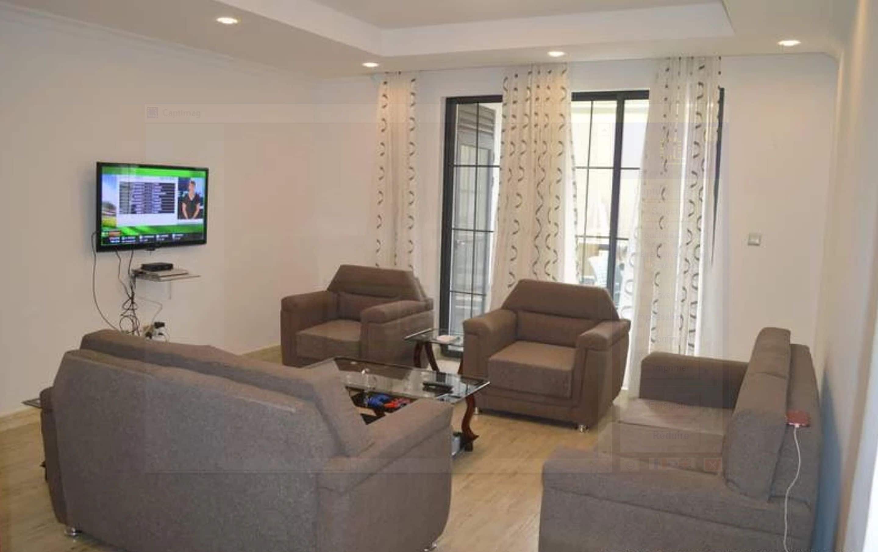 Apartment, 2 Bedrooms | Living area | Flat-screen TV