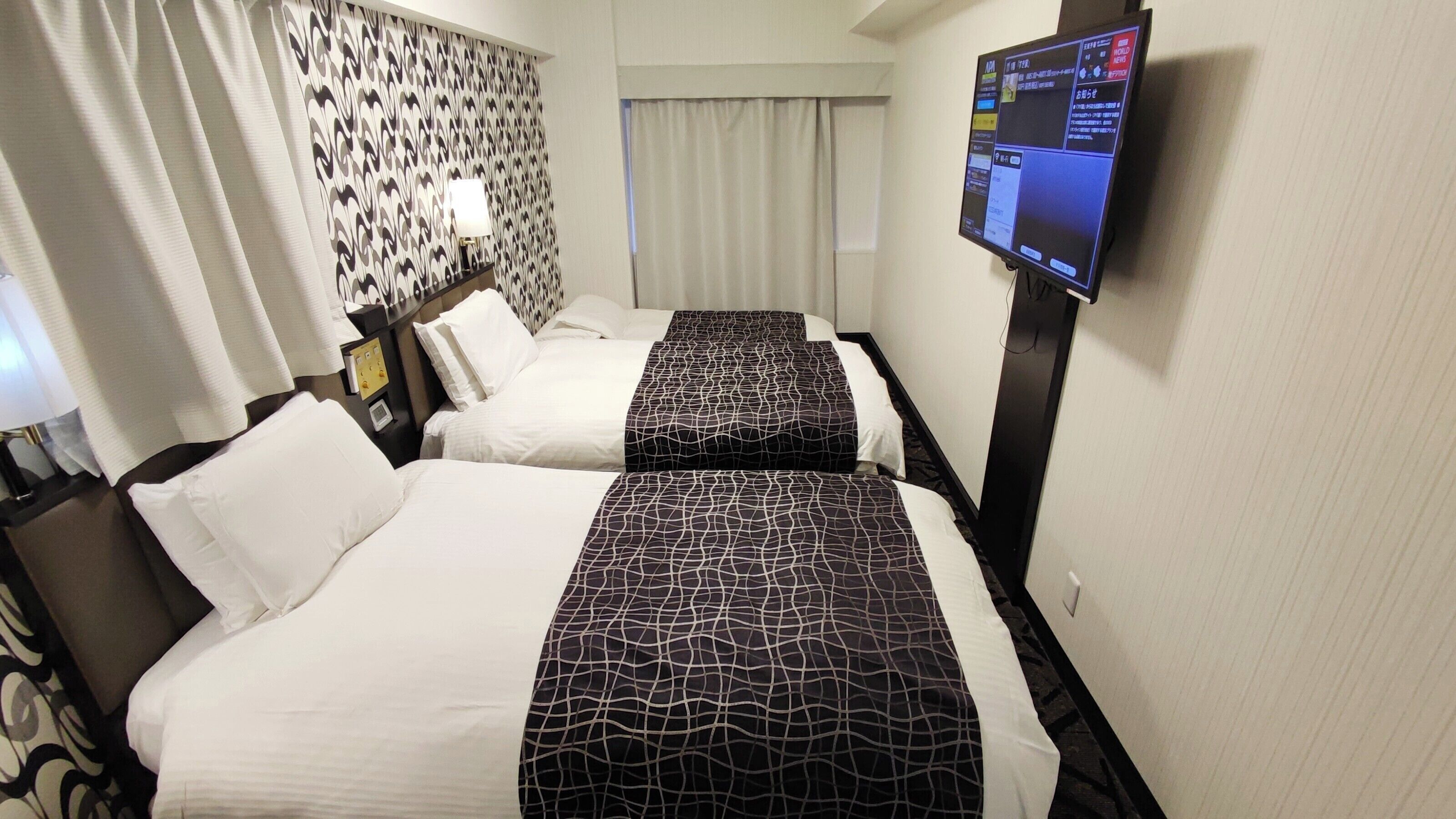 Down comforters, desk, blackout drapes, WiFi (free)
