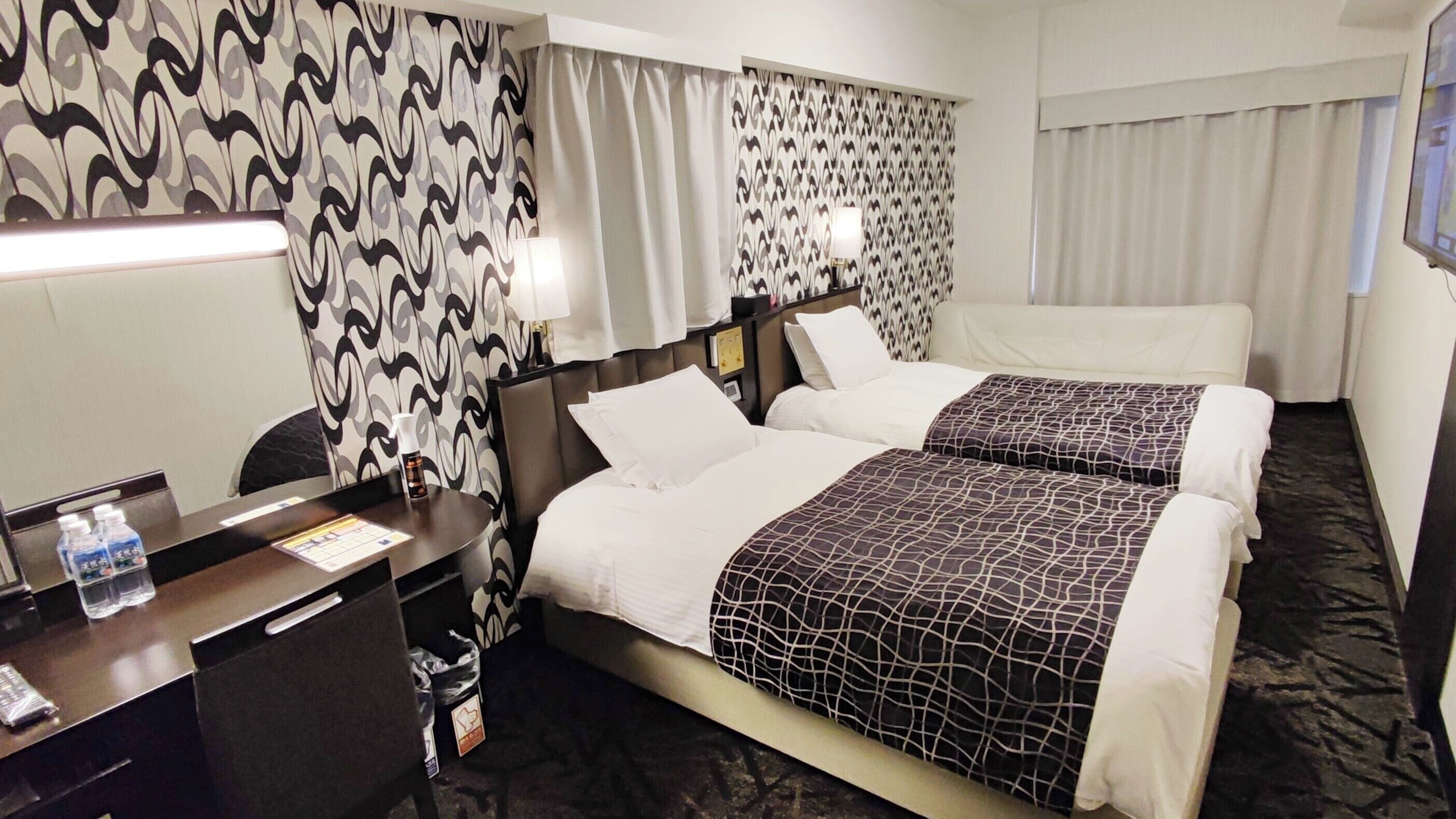 Down comforters, desk, blackout drapes, WiFi (free)