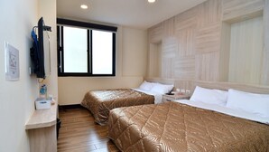 A hotel room with two beds, a wooden floor, a large window, and a wooden wall panel. - Matsu A Nan Jing B&B (Beigan)