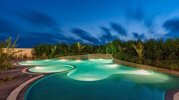 Outdoor pool, open 7:00 AM to 7:00 PM, pool loungers