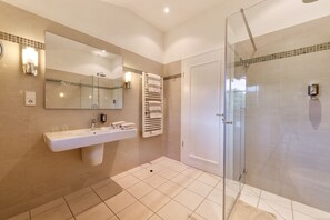 Superior Suite | Bathroom | Shower, rainfall showerhead, designer toiletries, hair dryer