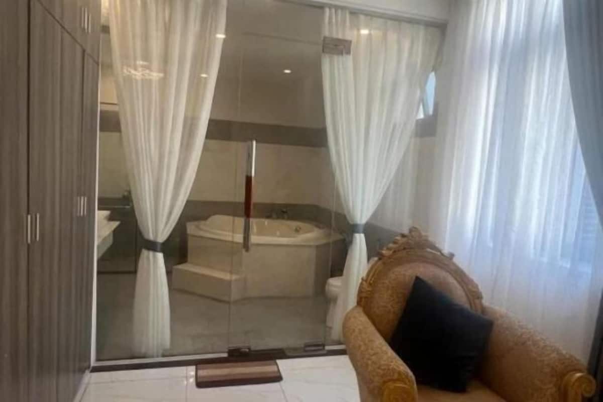 Bathroom | Separate bathtub and shower, rainfall showerhead, free toiletries
