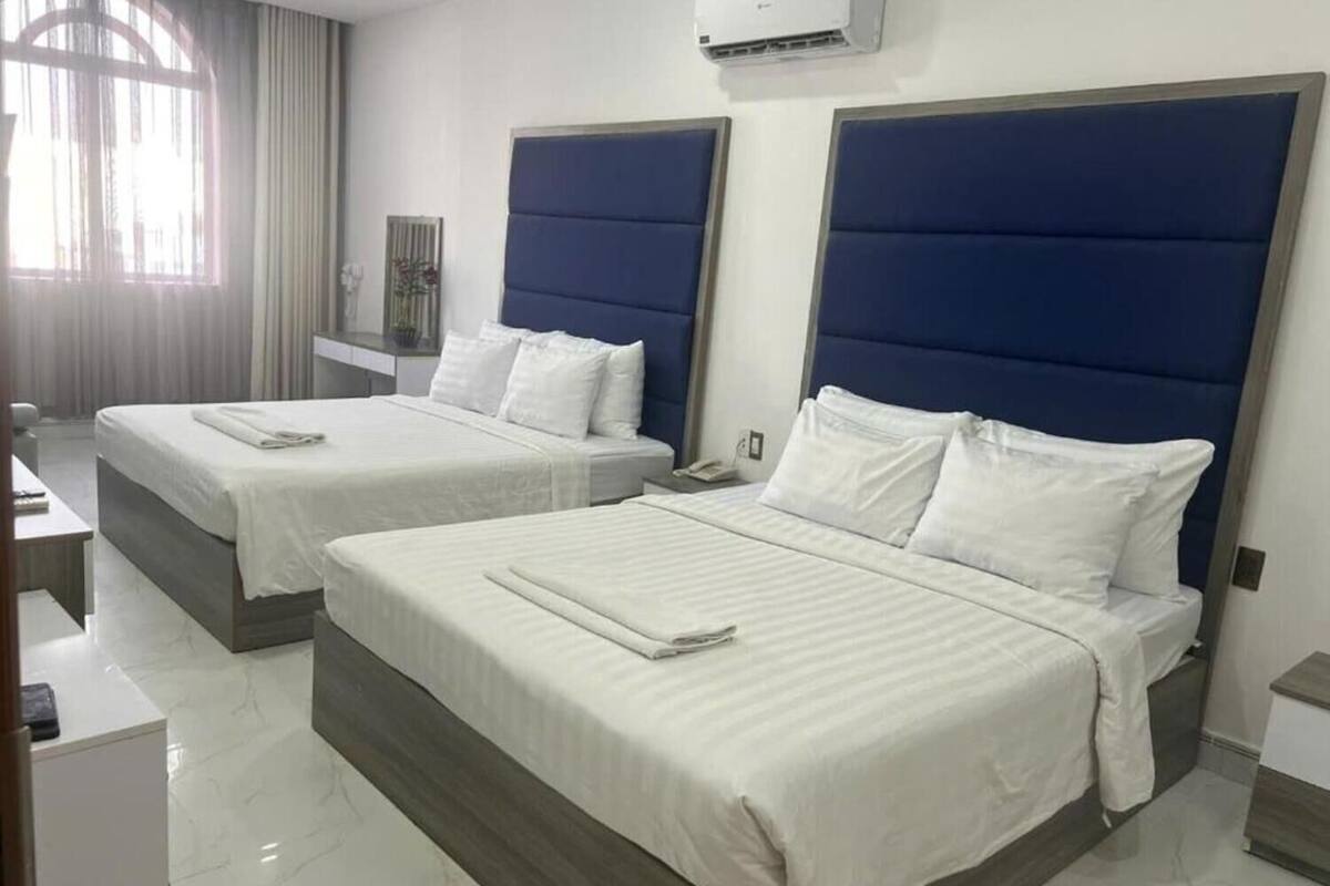 Family Room, City View | 1 bedroom, desk, soundproofing, free WiFi