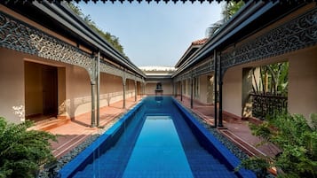 Outdoor pool, open 7:00 AM to 9:00 PM, pool umbrellas