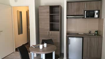 Superior Studio, Non Smoking (2 People) | Living area | 61-cm flat-screen TV with cable channels, TV