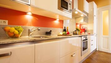 Luxury Apartment, Multiple Beds, Non Smoking, City View | Private kitchen | Full-size fridge, microwave, oven, stovetop