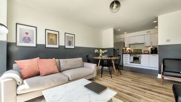 Apartment, 2 Bedrooms | Living area | Flat-screen TV