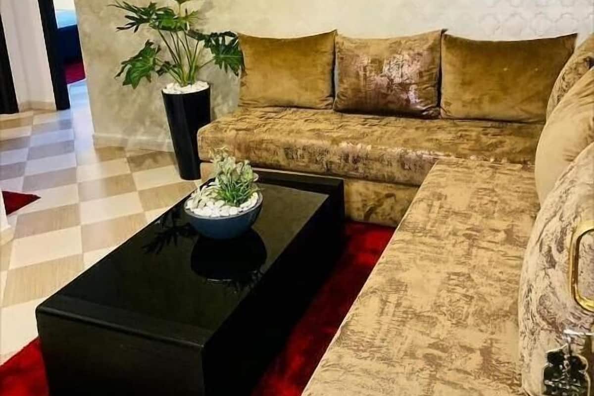 Family Apartment, Canal View | Living area | 32-inch flat-screen TV with satellite channels