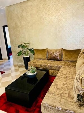 Family Apartment, Canal View | Living area | 32-inch flat-screen TV with satellite channels