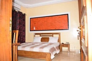 Appartement, 2 chambres | Rideaux occultants, chambres insonorisées, fer et planche à repasser