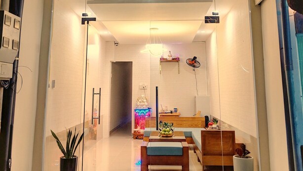 A modern interior with a large illuminated sign reading "SHELL". - Shell Hotel Condao (Ho Chi Minh City)